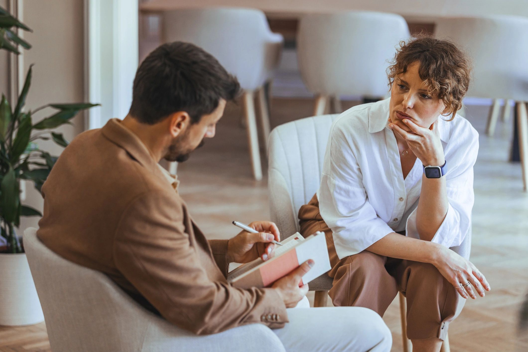 caring life coach with client